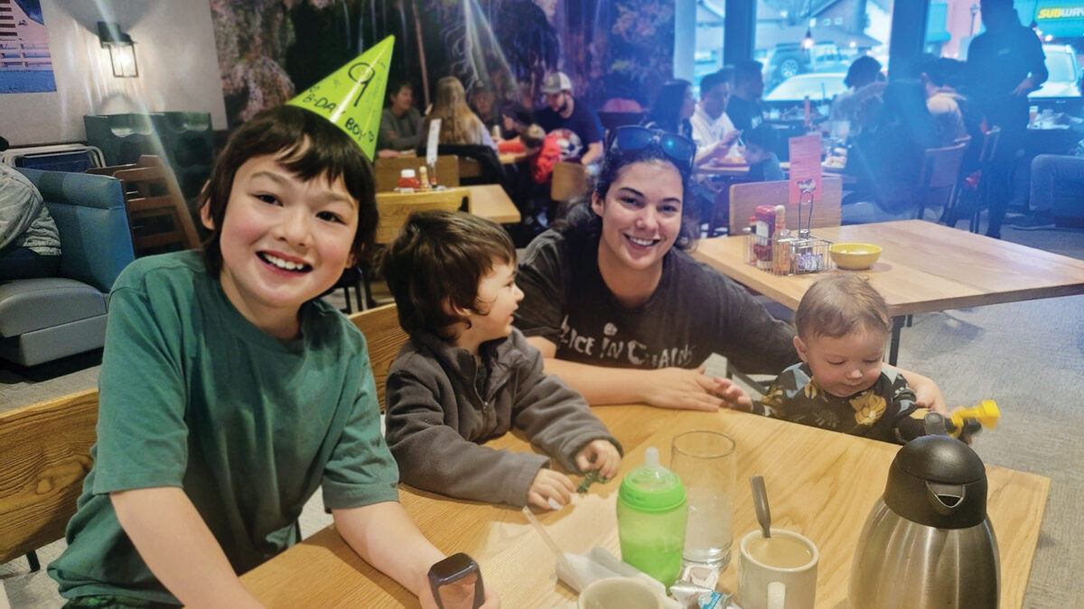 Charlie's daughter Caroline with grandchildren Leo, Nolan, and Henry