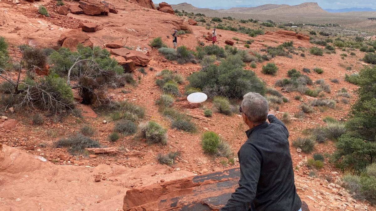 The author enjoying Wilderness Frisbee doubles with friends in Calico Basin, Las Vegas, in 2024. Note the Wilderness Frisbee “defensive” position assumed by the players.