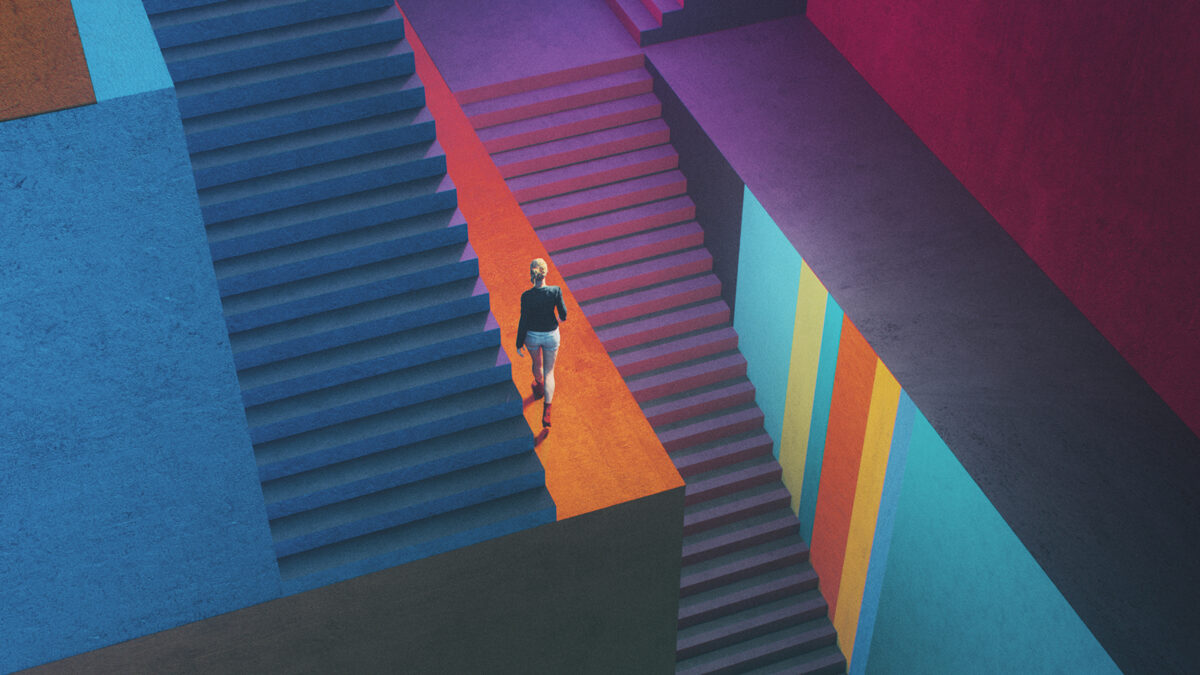 Abstract maze of concrete stairs with woman walking