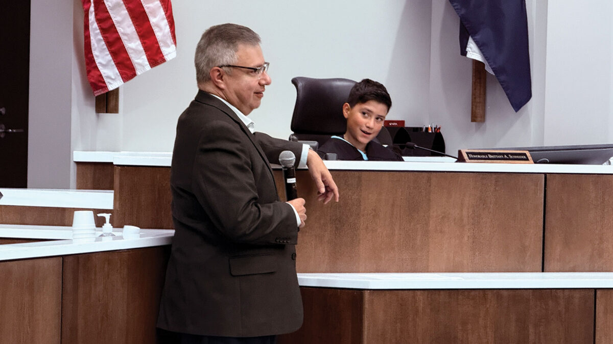 A fourth-grade student from Craig plays judge during the Goldilocks mock case. Judge Román wrote the court of appeals’ version of the Goldilocks script nearly 20 years ago, and it remains a favorite part of the Courts in the Community program.