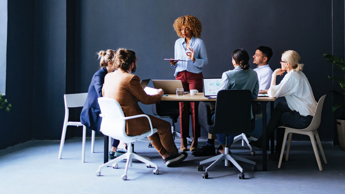 Group Of Businesspeople Having A Meeting At Their Company